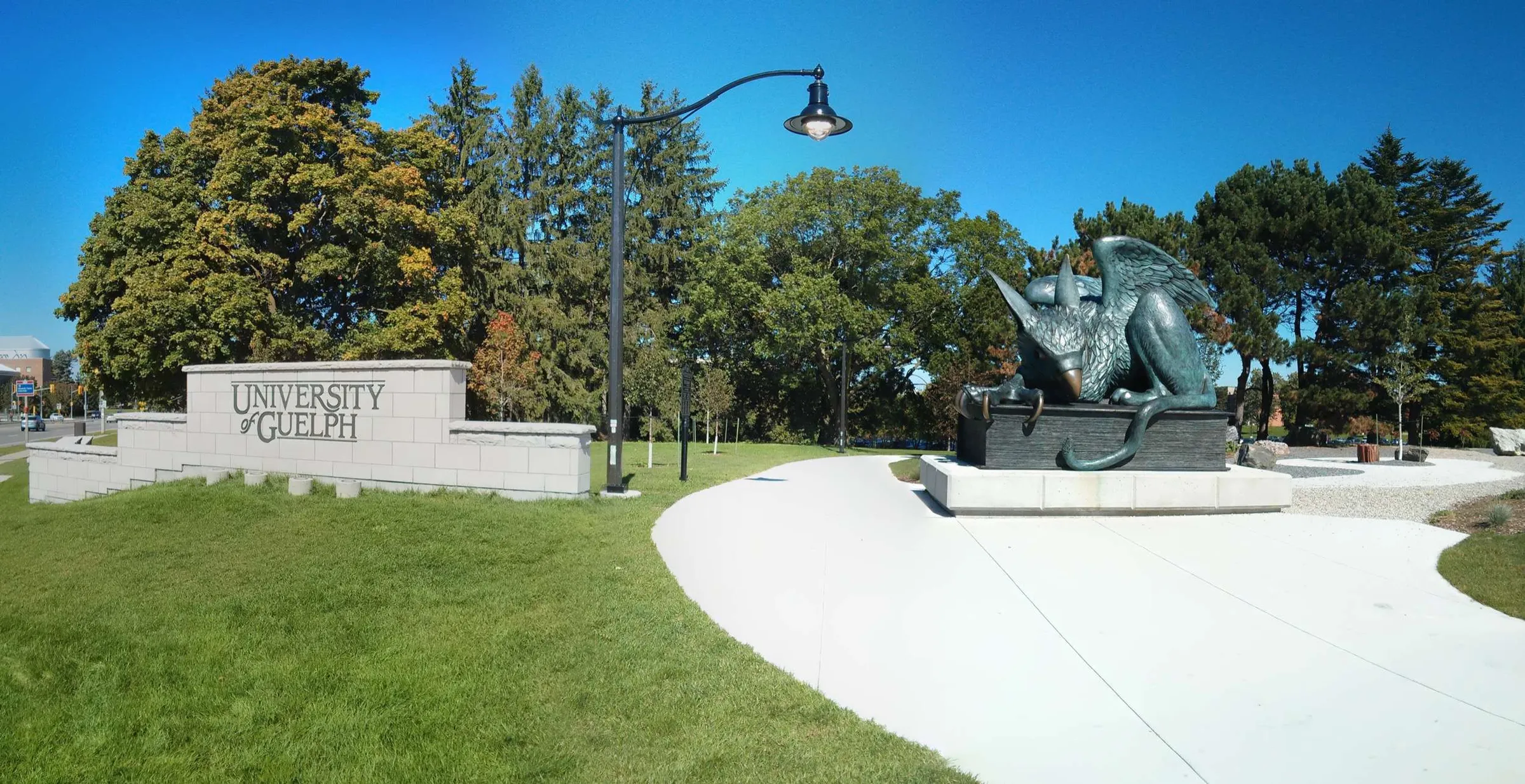 south entrance of University of Guelph with gryphon statue